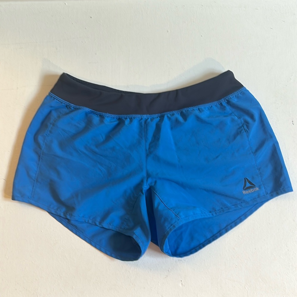 Blue and grey Reebok athletic shorts